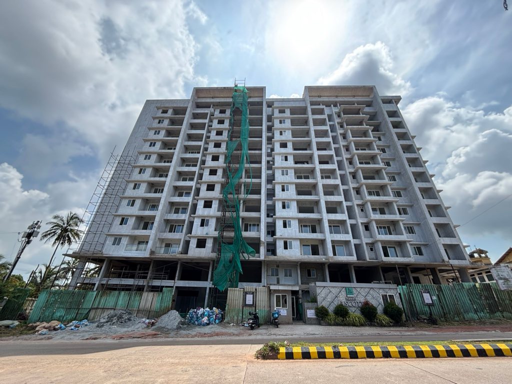 Inland Ascott apartment tower facade with scaffolding, September 2026.